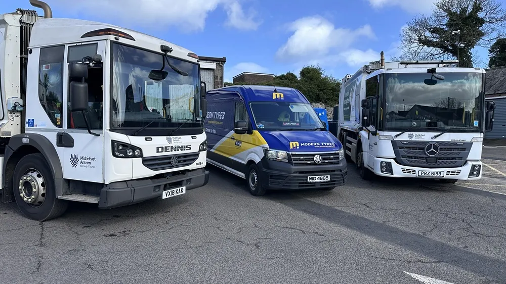 Image of a white Refuge lorry, blue van and white Refuge Lorry from Mid and East Antrim Borough Council, front view